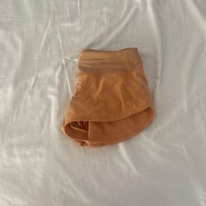 orange lululemon speedups low rise 2.5”